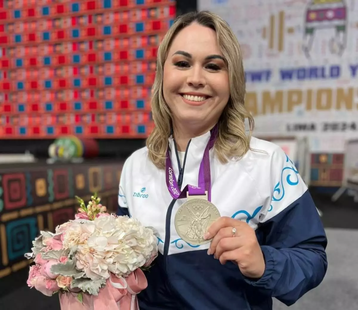 Казахстанка получила серебряную медаль Олиипиады спустя 12 лет