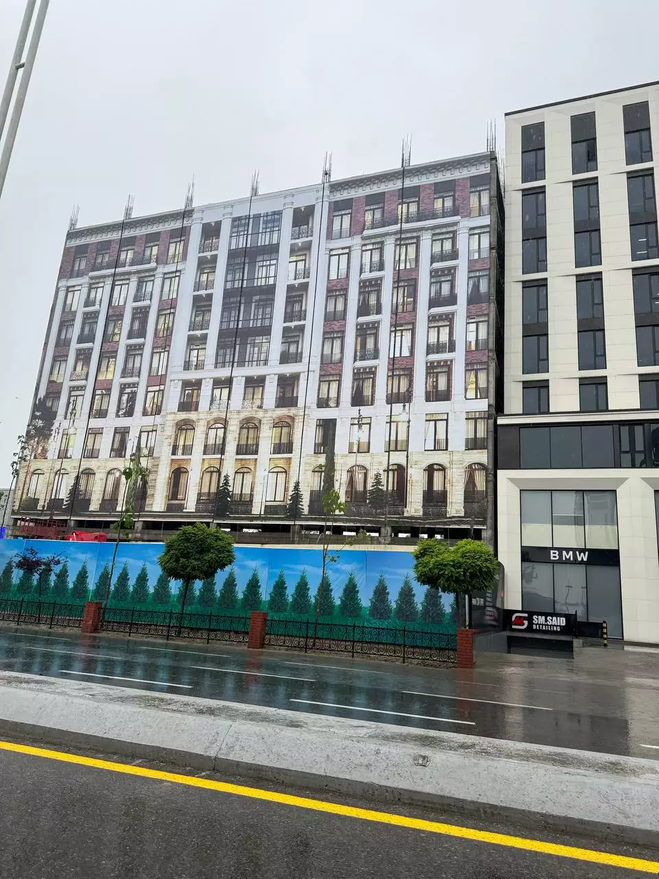 В Ташкенте к приезду Путина недостроенные здания замаскировали плакатами