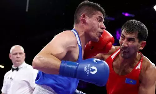Капитану сборной Казахстана по боксу «засчитали» победу в проигранном бою на Олимпиаде-2024