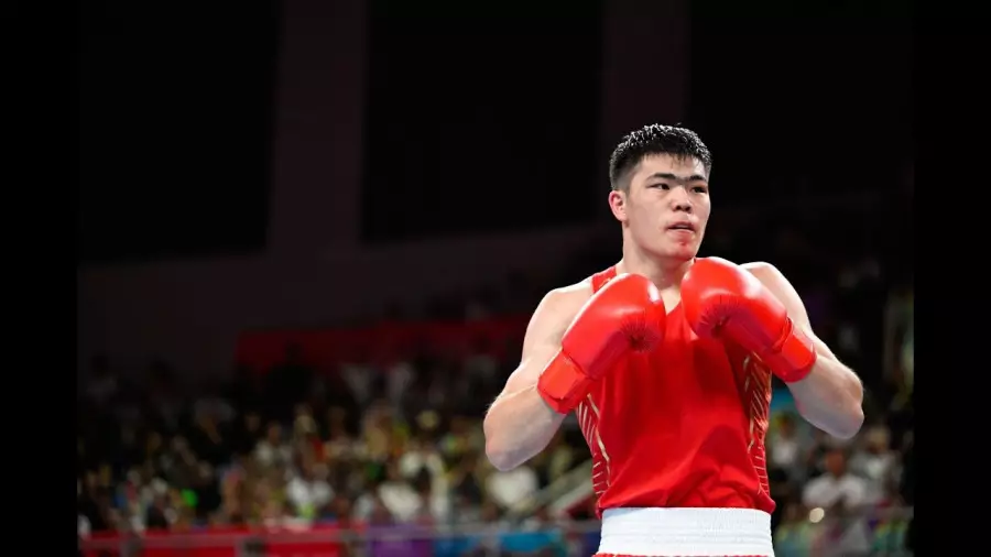Қытай құрамасындағы қазақ боксшы Олимпиаданы ерте аяқтады