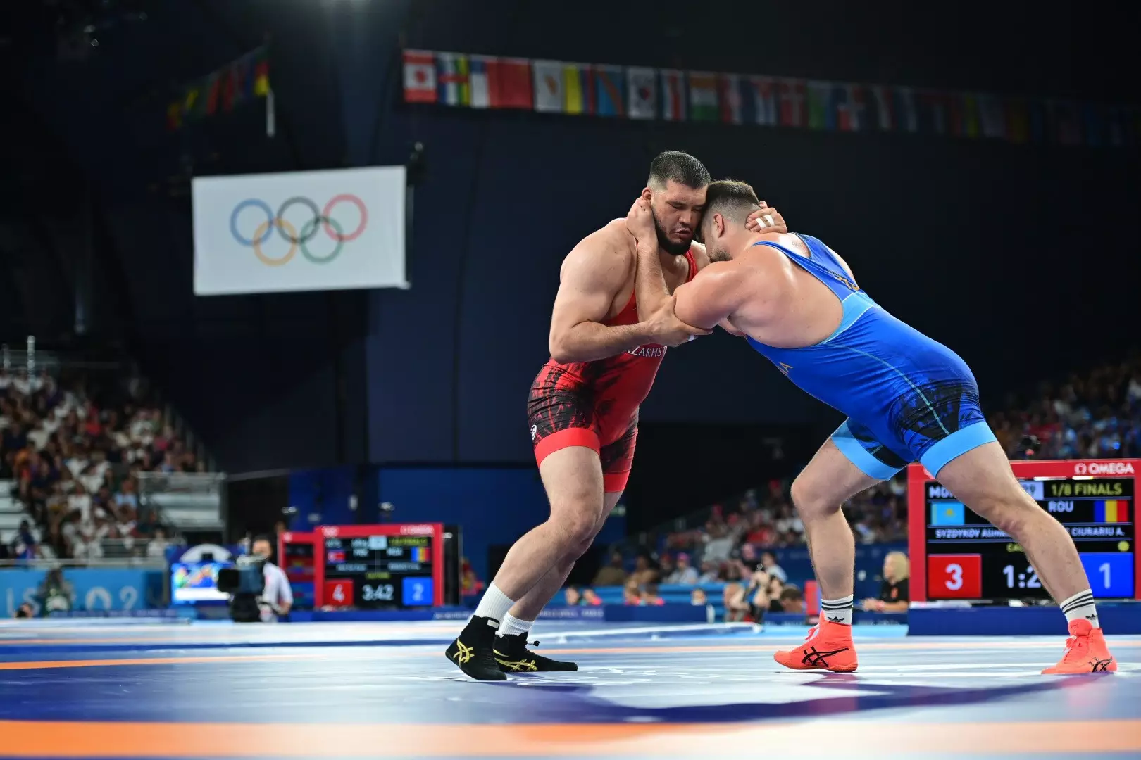 Сотворил сенсацию: казахстанский борец пробился в 1/4 финала Олимпиады
