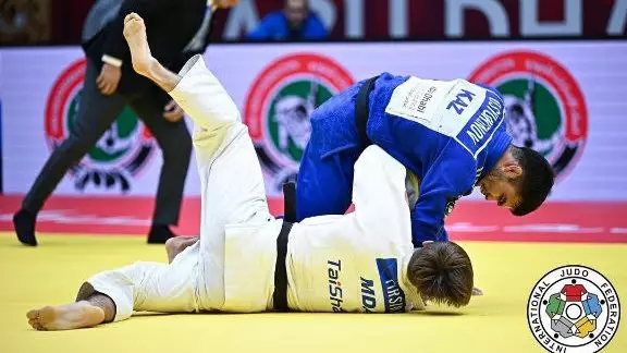 Abu-Dhabi Grand Slam: Дәурен Сүюкенов үздік үштікке енді