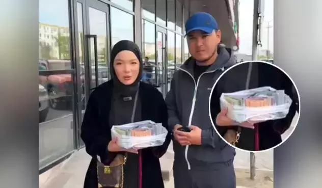 Абай Бегейдің қызы заңсыз лотерея ойнататын парақшасын жанталаса бұғаттап, жазбаларын өшіріп жатыр