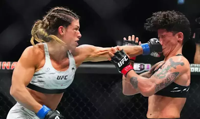 Жесткая заруба решила судьбу титульного поединка UFC