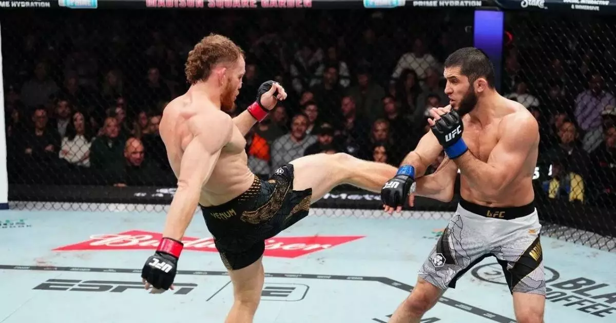  Ислам Махачев UFC-тің жартылай орта салмақ дәрежесінде чемпион атанды 