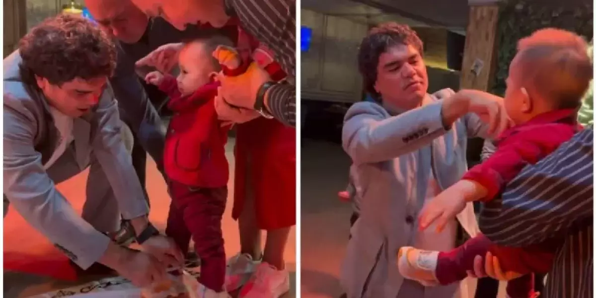 Әнші Кенжебек баланың тұсауын кесіп, оған қомақты ақша сыйлады (ВИДЕО)