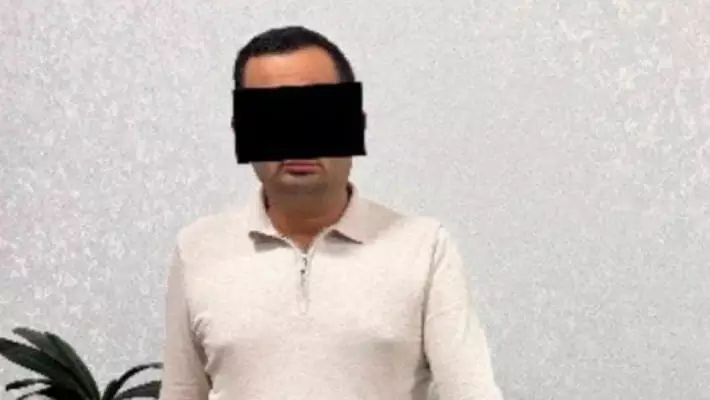 В Ташобласти ранее судимый помощник хокима задержан при получении 2 тыс. долларов