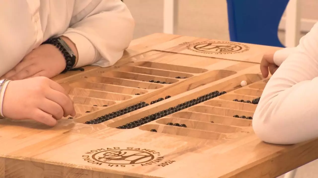 Алматыда оқушылар ЖИ-ға қарсы тоғызқұмалақ ойнады