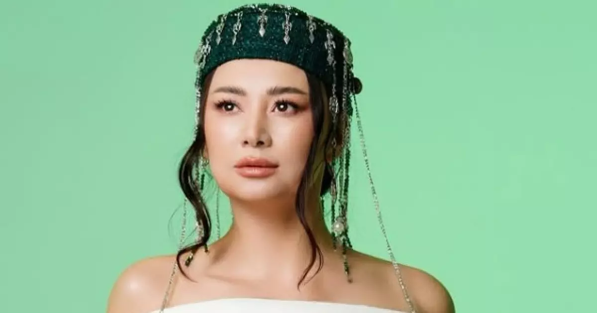   «Ұлттық киімнің құнын кетірді...»: Мадина Сәдуақасова сынға қалды   