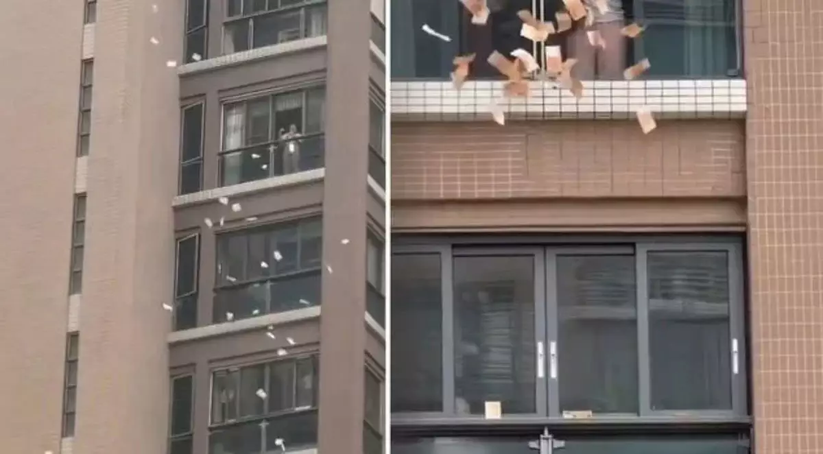 Қытайда "аспаннан ақша жауды": Әйел 60 миллион теңгені далаға шашқан