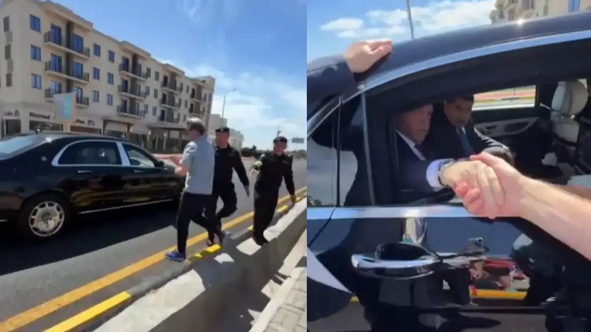 Ердоған Түркістандағы өзіне қарай жүгірген адамдарға тоқтап, көлігінен қол бұлғап, арнайылап суретке түсті 
